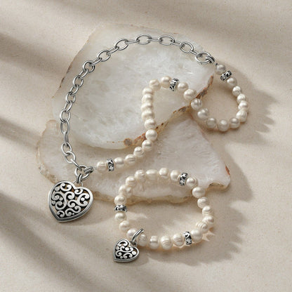 Brighton silver-plated heart charm bracelets with potato pearls and chain link styled with stone slabs
