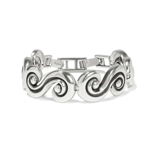 Brighton bracelet with silver-plated swirling wave links and hinged clasp on a white background