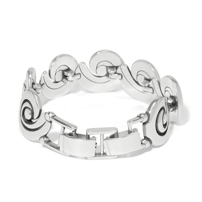 Brighton link bracelet with silver-plated swirl medallion links and fold-over clasp on a white background