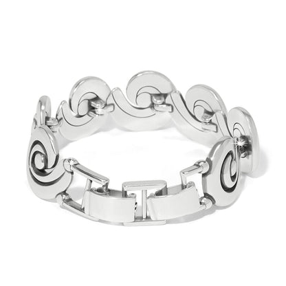 Brighton link bracelet with silver-plated swirl medallion links and fold-over clasp on a white background