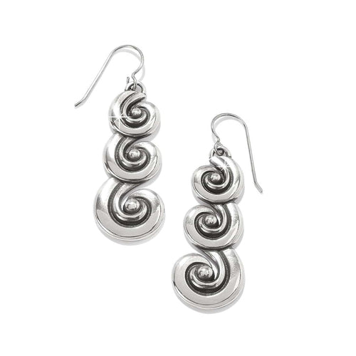 Brighton drop earrings with three tiered silver-plated swirl medallions on French hook wires on a white background