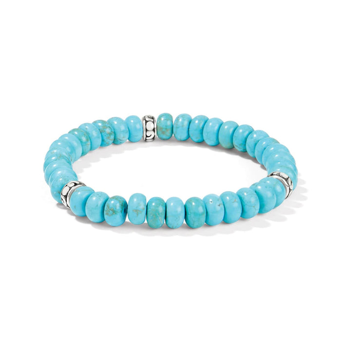 Brighton beaded bracelet with turquoise stones and silver-plated accent beads featuring scroll detail on a white background