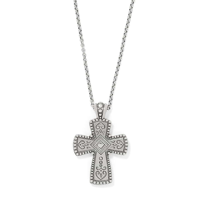 Brighton cross pendant necklace with silver-tone scrollwork, beaded edges, and crystal center accent on a white background