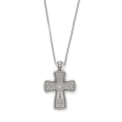 Brighton cross pendant necklace with silver-tone scrollwork, beaded edges, and crystal center accent on a white background
