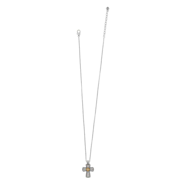 Brighton cross pendant necklace with two-tone finish, crystal accents, and scroll detailing on a white background
