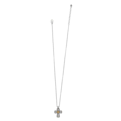 Brighton cross pendant necklace with two-tone finish, crystal accents, and scroll detailing on a white background