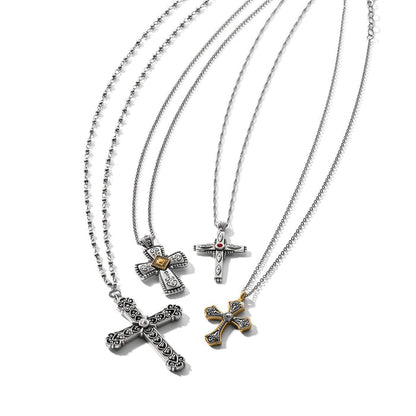 Brighton four cross pendant necklaces in two-tone finish with crystal accents and ornate scrollwork on a white background