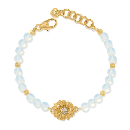 Brighton beaded bracelet with opalescent beads, gold-plated flower centerpiece with crystals, and lobster clasp on a white background