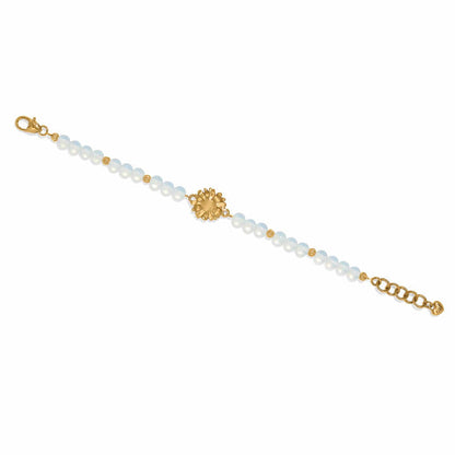 Brighton beaded bracelet with opalescent crystals, gold-plated flower centerpiece, and lobster clasp on a white background