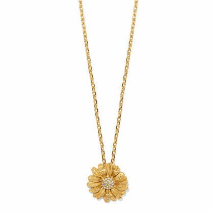 Brighton pendant necklace with gold-plated daisy flower and crystal center on a delicate chain on a white background