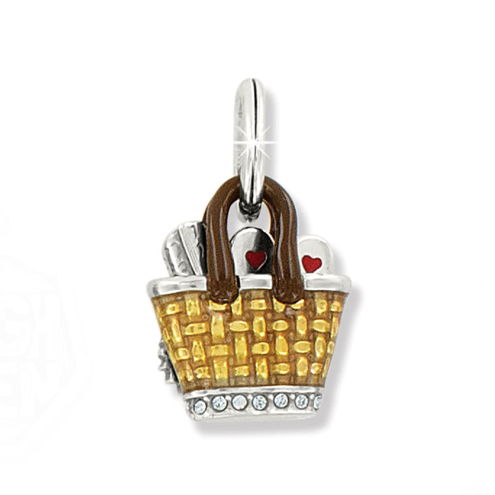 Brighton picnic basket charm with yellow enamel weave, brown handles, red heart accents, and crystals on a white background