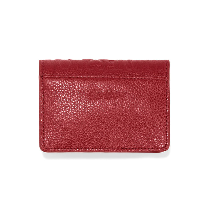 Brighton red pebbled leather card case with embossed logo and front slip pocket on a white background