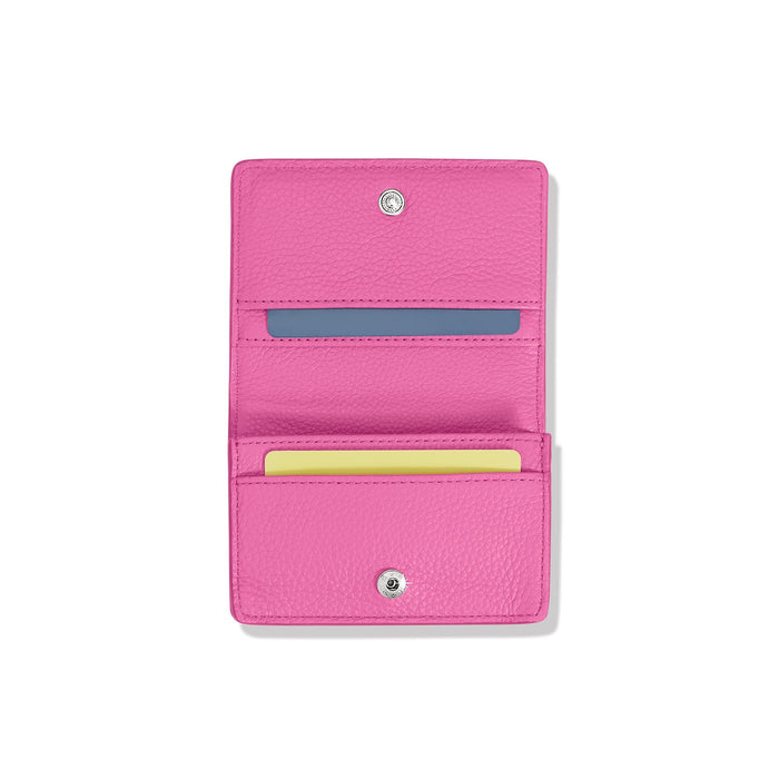 Brighton pink leather card wallet shown open with interior card slots and silver-tone snap closure on a white background
