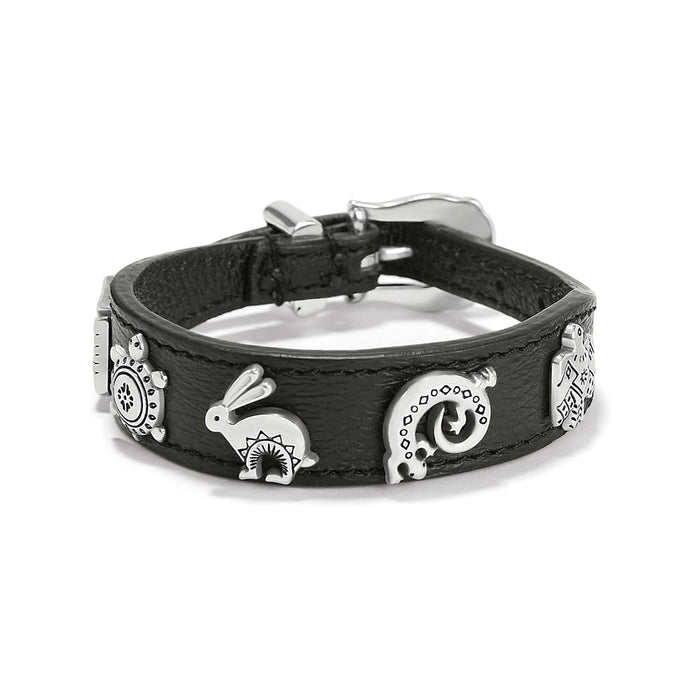 Brighton black leather bracelet with silver-plated animal charms and buckle closure on a white background