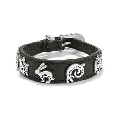 Brighton black leather bracelet with silver-plated animal charms and buckle closure on a white background