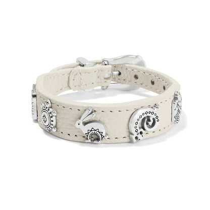 Brighton cream leather bracelet with silver-plated animal charms and buckle closure on a white background