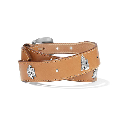 Brighton tan leather wrap belt with silver-tone thunderbird, wolf, and medallion charms and buckle on a white background