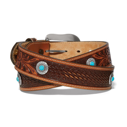 Brighton leather belt with tooled floral and basketweave patterns, turquoise howlite conchos, and silver-tone buckle on a white background