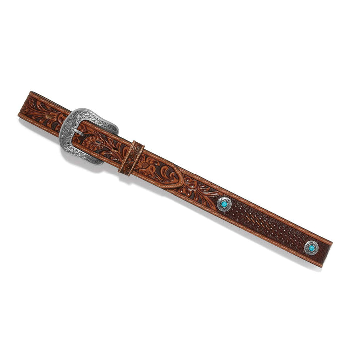 Brighton tooled leather belt with floral engraved buckle, basketweave detail, and turquoise howlite conchos on a white background