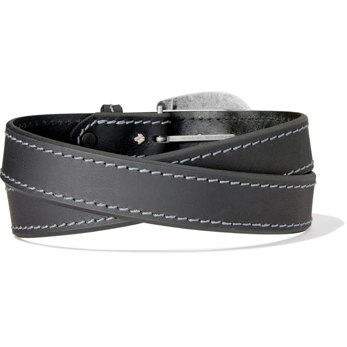 Brighton black leather belt with contrast gray stitching and silver-tone buckle, coiled on a white background