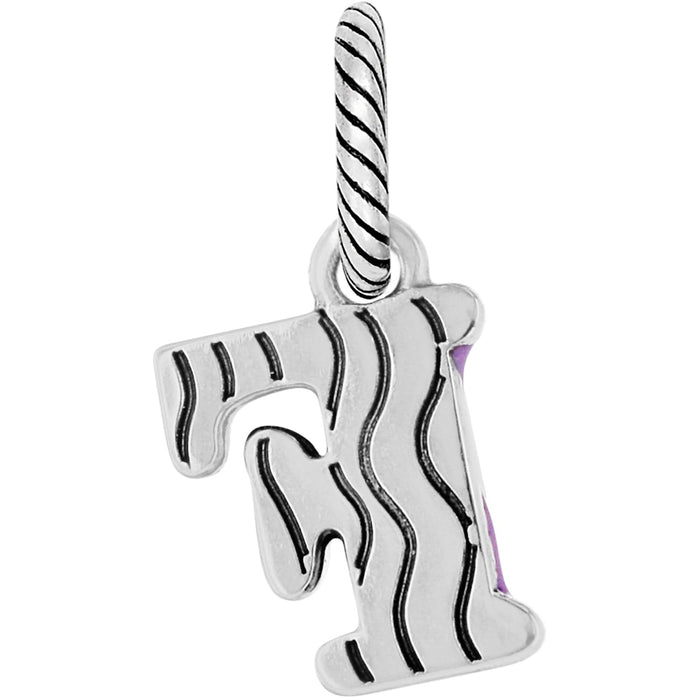 Brighton unicorn charm with silver-tone striped mane, twisted horn, and purple enamel accents on a white background