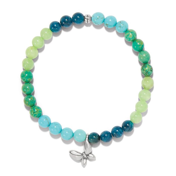 Brighton beaded bracelet with green, turquoise, and blue stone beads and silver-plated butterfly charm on a white background