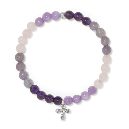 Brighton beaded bracelet with purple, lavender, and pink stones featuring a silver-tone crystal cross charm on a white background