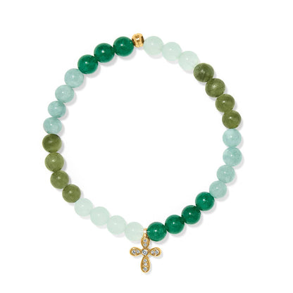 Brighton beaded bracelet with green jade-toned beads and gold-plated cross charm with crystal accents on a white background