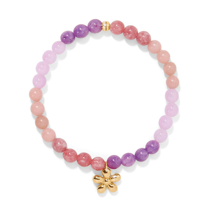 Brighton beaded stretch bracelet with pink, purple, and coral beads and gold-plated flower charm on a white background