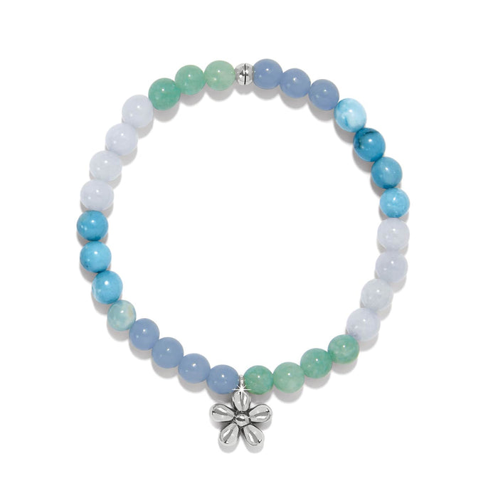 Brighton beaded stretch bracelet with blue and green stone beads and silver-plated flower charm on a white background