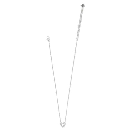 Brighton silver-plated necklace with small crystal heart pendant and lobster clasp shown extended on a white background