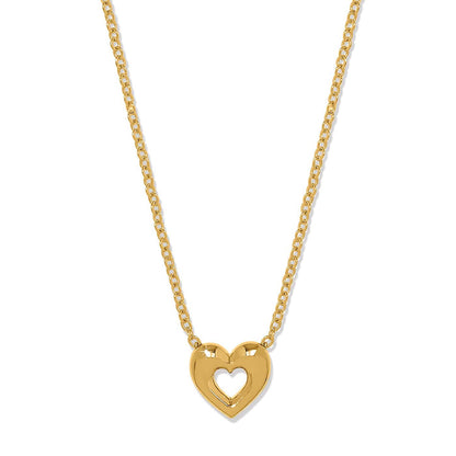 Brighton heart pendant necklace with gold-plated chain and polished cutout heart charm on a white background