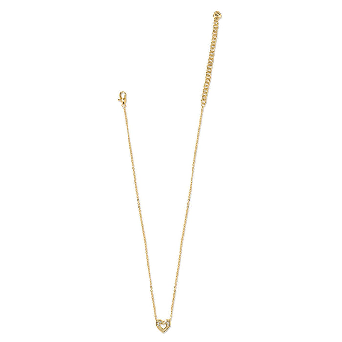 Brighton gold-plated heart pendant necklace with crystal accents, lobster clasp, and extender chain on a white background