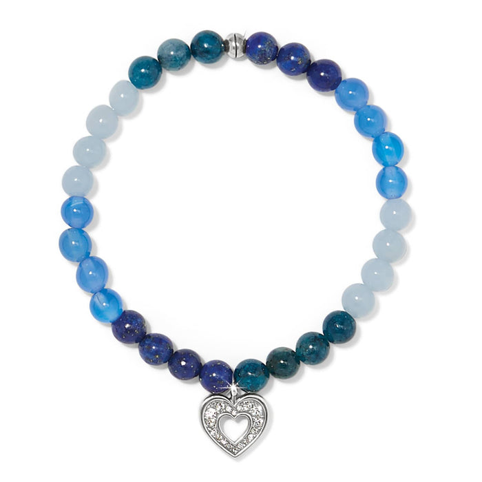 Brighton beaded bracelet with blue stone beads, silver-plated magnetic clasp, and crystal heart charm on a white background