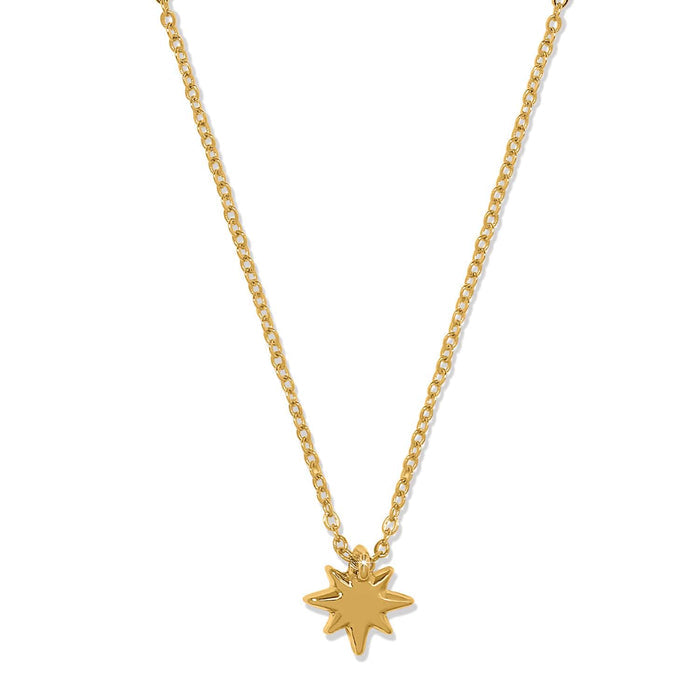 Brighton pendant necklace with gold-plated starburst charm on a delicate gold-plated chain on a white background