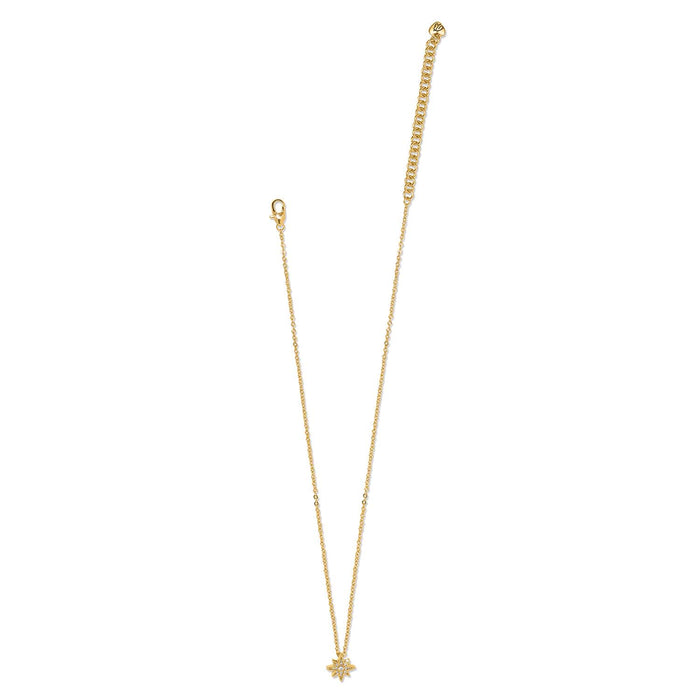 Brighton gold-plated chain necklace with starburst pendant featuring crystal accents and lobster clasp on a white background