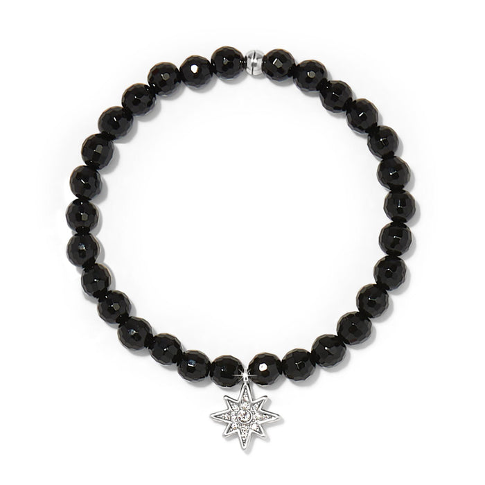 Brighton beaded bracelet with faceted black beads and silver-plated crystal star charm on a white background