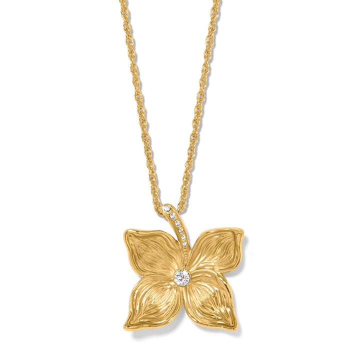 Brighton pendant necklace with gold-plated four-petal flower and crystal accents on a white background