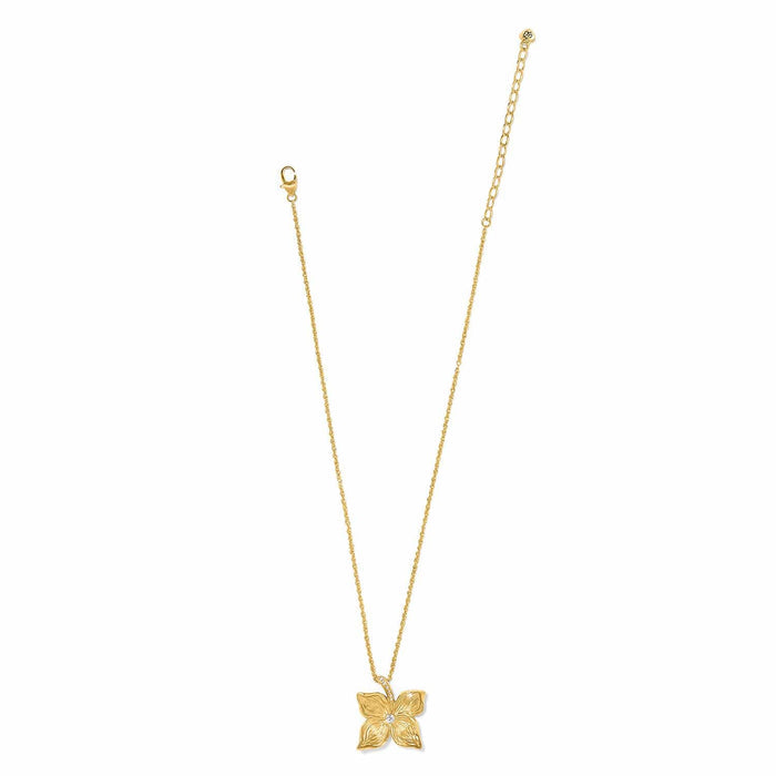 Brighton pendant necklace with gold-plated floral pendant, crystal center accent, and delicate chain on a white background