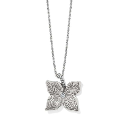 Brighton pendant necklace with silver-plated flower design, crystal center stone, and rope chain on a white background
