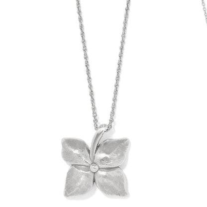 Brighton pendant necklace with silver-plated four-petal flower design and textured petals on delicate chain on a white background