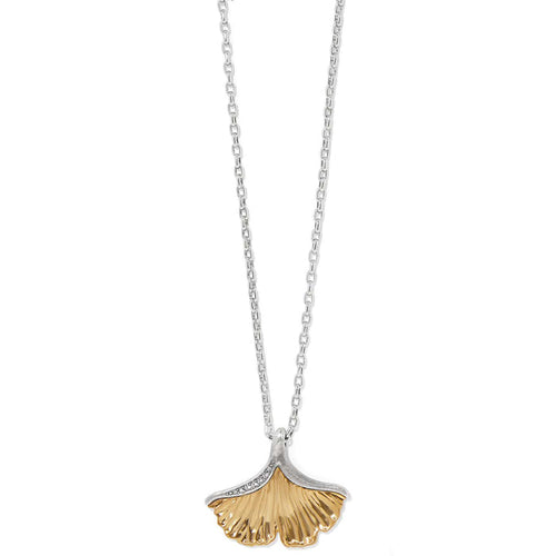 Brighton pendant necklace with gold-tone ginkgo leaf, silver-tone chain, and crystal accents on a white background
