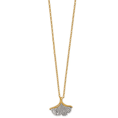 Brighton pendant necklace with two-tone ginkgo leaf charm and crystal accents on gold-tone chain on a white background