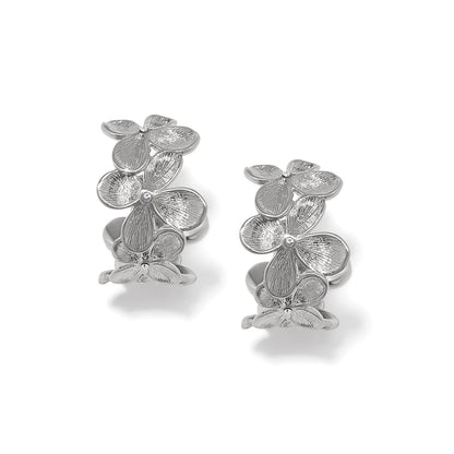 Brighton hoop earrings with silver-plated flower clusters and crystal centers on a white background