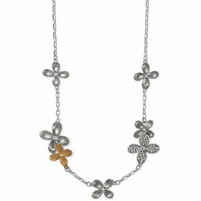 Brighton necklace with silver-tone and gold-tone flower stations featuring crystal accents on a white background