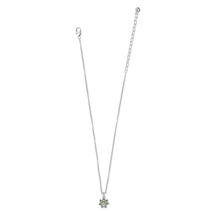 Brighton silver-plated pendant necklace with green crystal flower charm and lobster clasp on a white background
