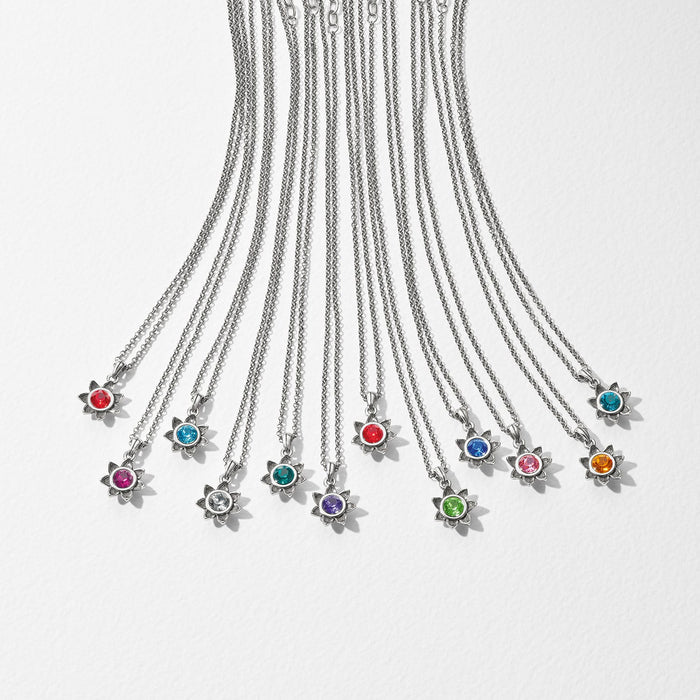 Brighton silver-plated flower pendant necklaces with assorted crystal centers in multiple colors arranged in a row on a white background