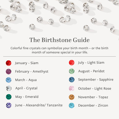 Brighton birthstone guide chart styled with scattered crystals, listing twelve monthly crystal colors from January through December