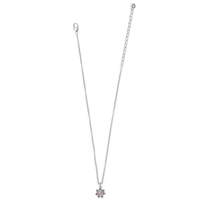 Brighton silver-plated pendant necklace with small pink crystal flower charm and lobster clasp on a white background