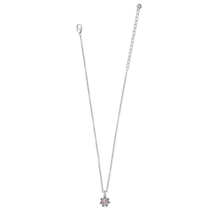Brighton silver-plated pendant necklace with small pink crystal flower charm and lobster clasp on a white background